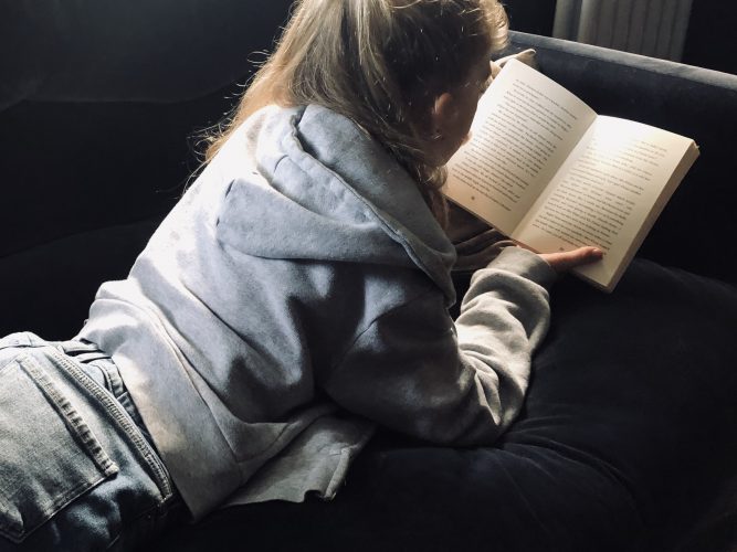 The wonderful distraction of books: Reading to support children
